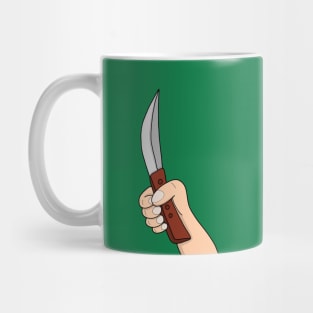 A hand holding a knife Mug